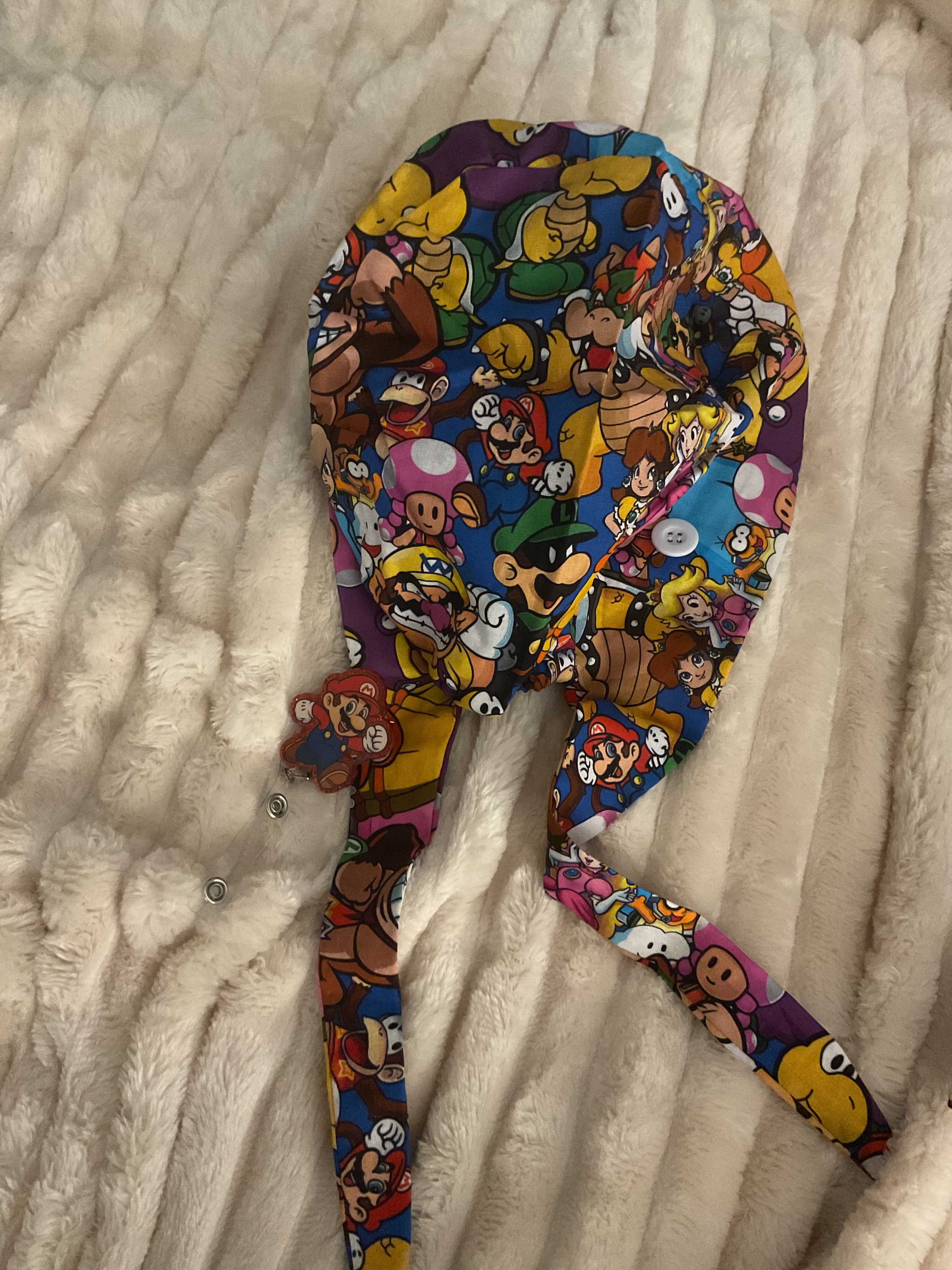 Boss Battle Scrub Cap and Badge Reel